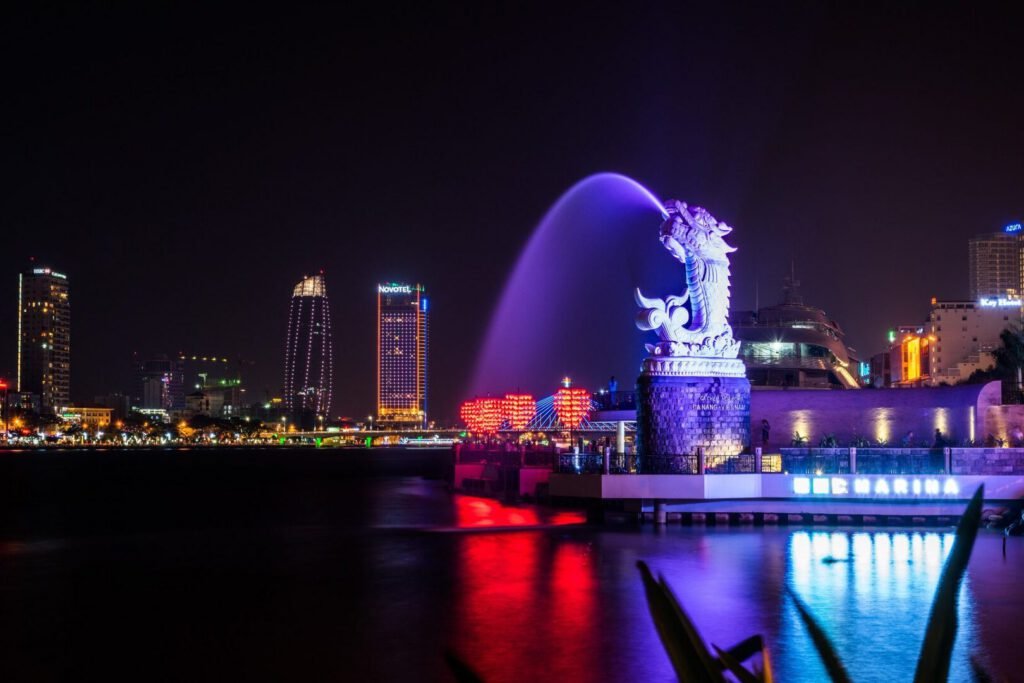 Dragon Bridge at night with city lights, Da Nang