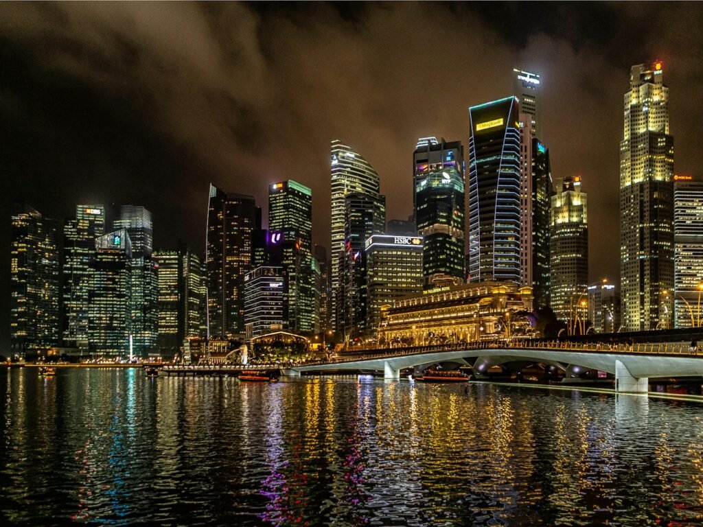 Night walk along the Waterfront Promenade and Jubilee Bridge from Chinatown to Marina Bay in Singapore