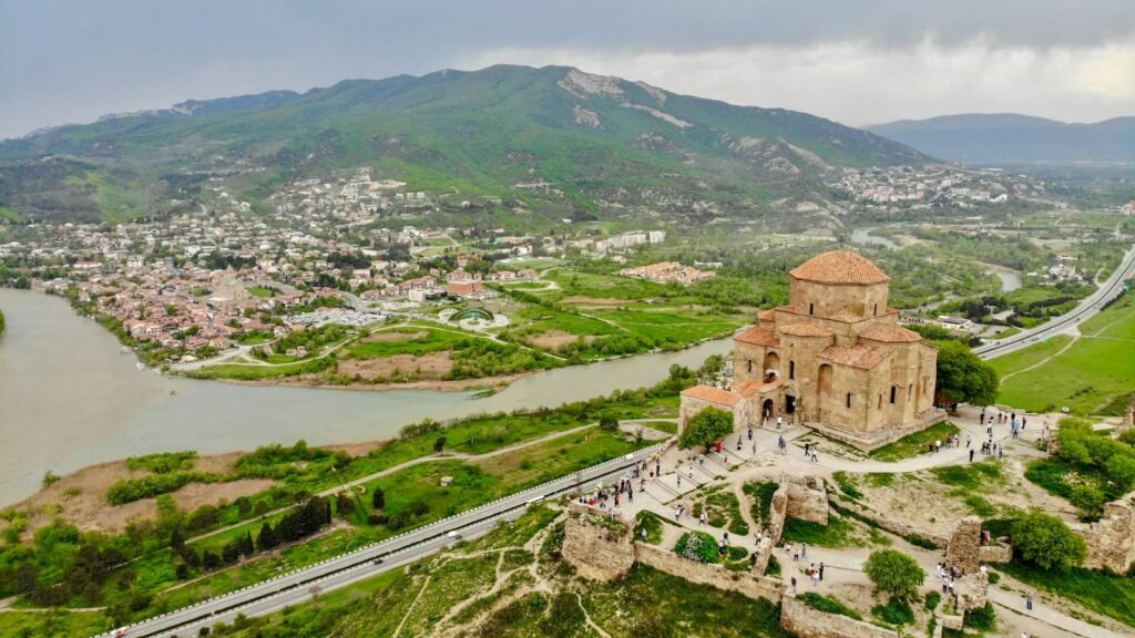 Mtskheta and the Aragvi–Mtkvari river confluence seen from Jvari Monastery during a Tbilisi to Mtskheta day trip.